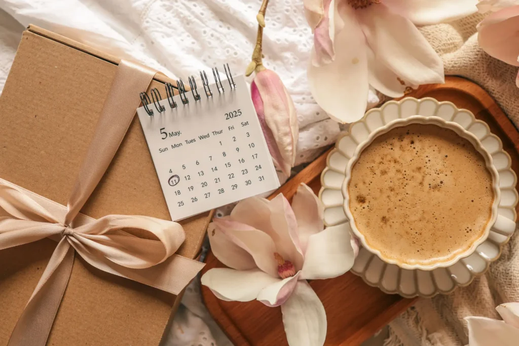 A cozy scene with a calendar, flowers, and a pie.